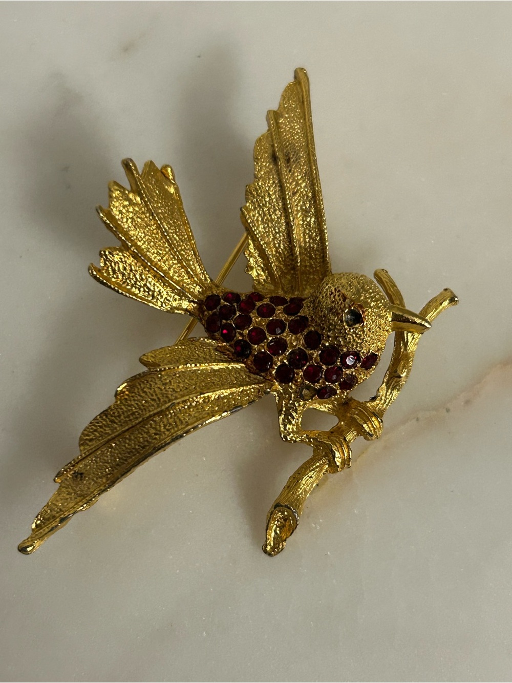 Golden Bird on a branch with Red Crystal Accents